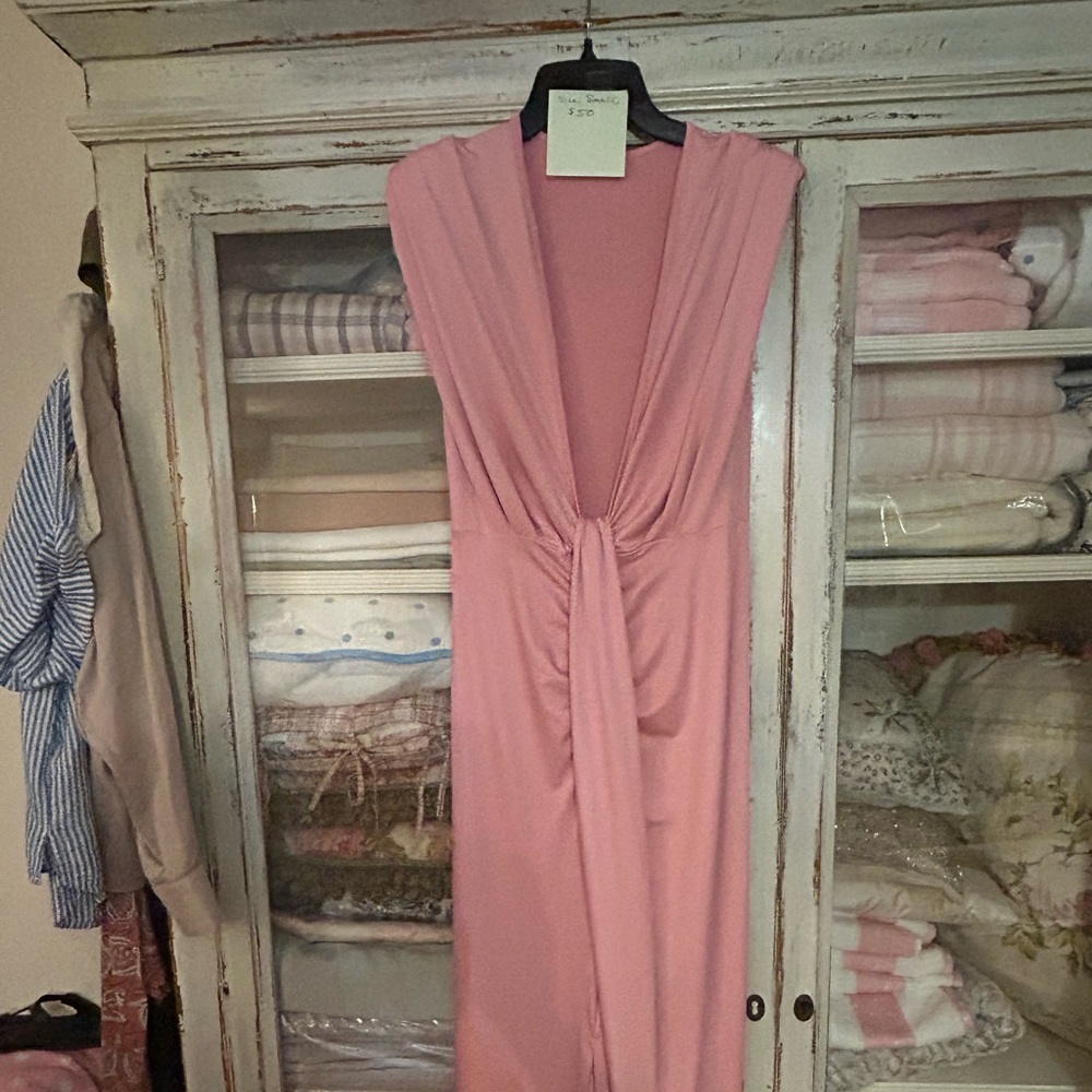Beautiful light pink fitted dress. Never worn.